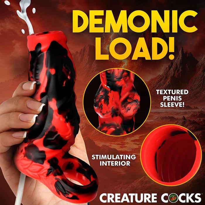 A hand holds the Hell Hound Canine Squirting Penis Enhancer, a red and black textured fantasy sleeve with an open tip. Bold yellow "DEMONIC LOAD!" text highlights its stimulating interior against a fiery background.