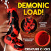 A hand holds the Hell Hound Canine Squirting Penis Enhancer, a red and black textured fantasy sleeve with an open tip. Bold yellow "DEMONIC LOAD!" text highlights its stimulating interior against a fiery background.