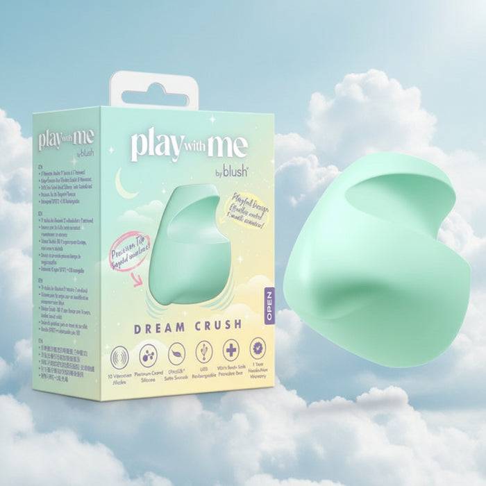 A light green Dream Crush Waterproof Ergonomic Finger Vibrator, made of body-safe silicone, and its pastel, illustrated "play with me by blush" box float among clouds, displaying playful packaging and product details.