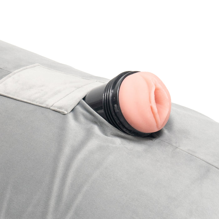 A close-up of the Liberator Humphrey Pillow-Style Sex Toy Mount reveals its ergonomic design for hands-free pleasure and comfort.