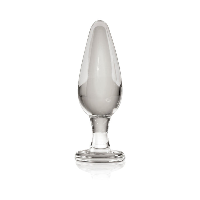 The Icicles No. 26 Clear Glass Butt Plug, made from borosilicate glass with a smooth, tapered shape and flared base, stands upright on a white background—ideal for temperature play.