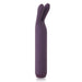 Introducing the Je Joue Powerful Bullet with Flexible Rabbit Ears - Purple by Je Joue: a sleek, cylindrical silicone vibrator featuring two flexible, bunny ear-like extensions at the top. Equipped with three control buttons at the base for adjustable settings and rumbly vibrations, this modern and smooth rechargeable design ensures a discrete appearance.