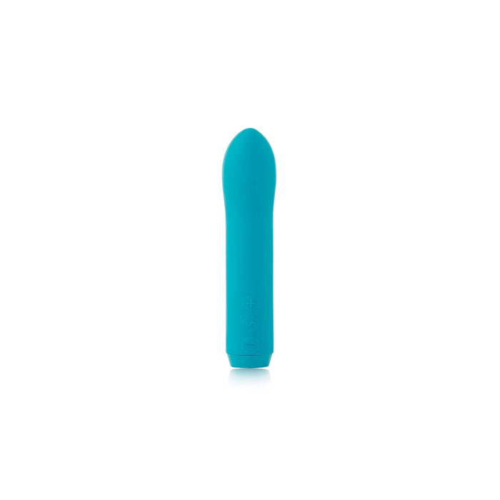 A Je Joue Powerful Internal or External Bullet - Teal, a sleek turquoise-blue cylindrical device with a slightly tapered, rounded tip, is centered against a white background. Made from premium silicone, the bullet features a smooth and minimalist design with a subtle "+ -" symbol near its base. Additionally, it boasts waterproof functionality and USB rechargeability for added convenience.