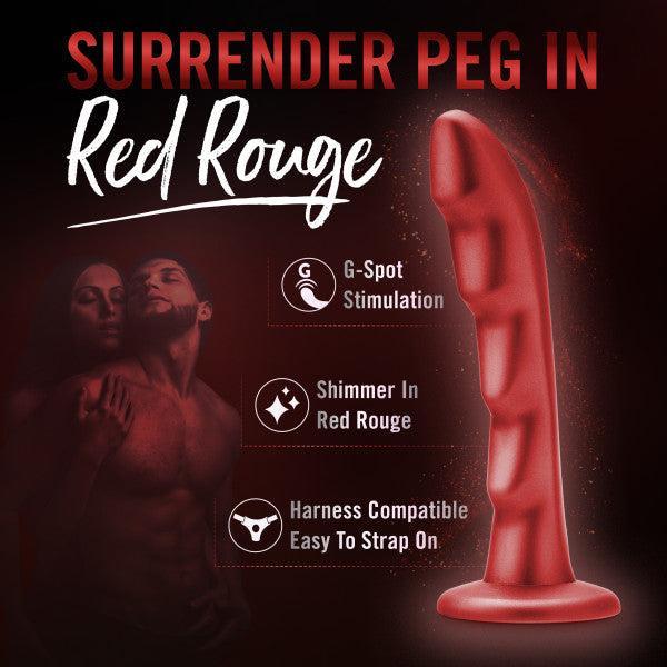 The product featured is the "Jealousy 7 Inch Rippled Silicone Dildo" by Blush, characterized by its red hue and rippled texture. It's noted for G-spot stimulation and compatibility with strap-on play. The shimmering color adds allure, while a background image of a couple embracing enhances its romantic appeal.