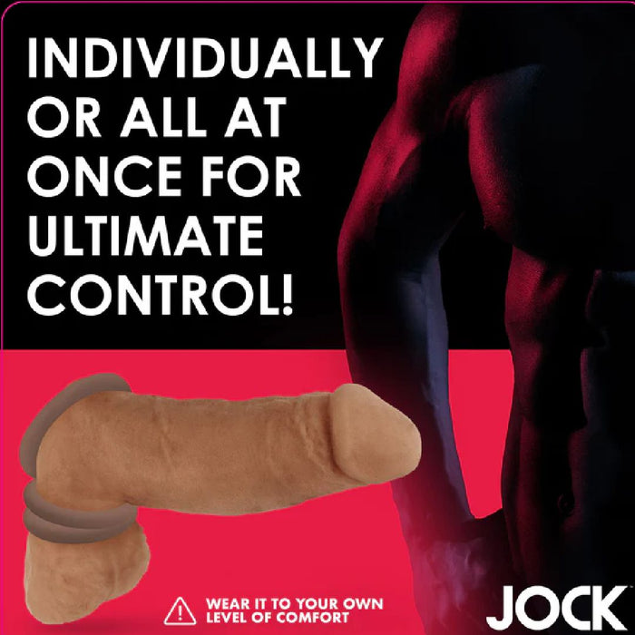 A bold advertisement features a muscular figure in the background. The text reads, "Individually Or All At Once For Ultimate Control!" Showcasing the Jock Discreet Stretchy Silicone Cock Ring Set of 3 - Chocolate by Curve Toys, made of stretchy silicone for comfort. Optional cock rings ensure an erection harder than ever.