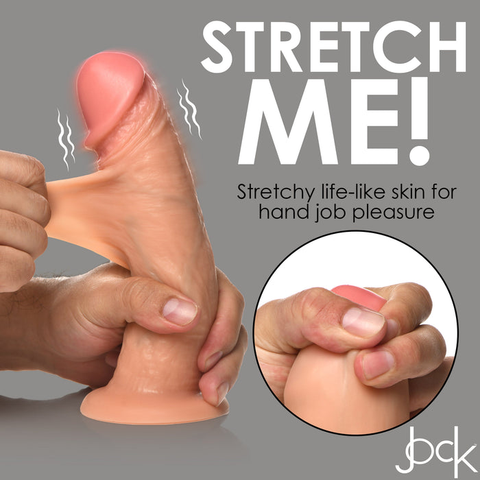 An image of the Jock Real Skin Vibrating 8 Inch Silicone Suction Cup Dildo - Vanilla by XR Brands being stretched by hands. The text on the image reads, "STRETCH ME! Stretchy life-like skin for hand job pleasure." An inset shows a close-up of the dual density model's tip being squeezed.