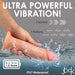 A hand holds the Jock Real Skin Vibrating 8 Inch Silicone Suction Cup Dildo - Vanilla by XR Brands in an ad. Text reads "ULTRA POWERFUL VIBRATION!", with "3 Speeds" and "7 Patterns" indicated by arrows and wavy lines. It also mentions "Run Time: 1.5 Hours" and "IPX7 Waterproof". The background shows water splashes.