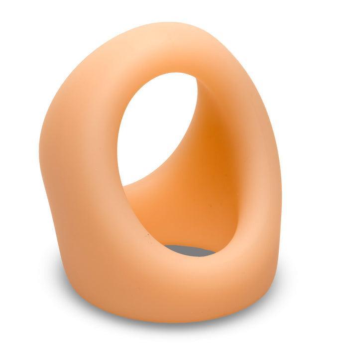 The JOCK Silicone Cock & Ball Ring in light skin tone is an oval, body-safe silicone ring with a large central opening and smooth curves, designed for erection support and shown on a white background.