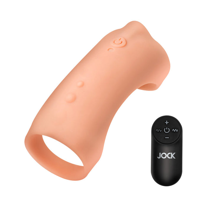 The Jock Vibrating Penis Sleeve and Support with Remote - Caramel is pictured with control buttons, a power symbol, and a black remote labeled "JOCK" featuring plus, minus, and wave icons—an ideal couples sex toy for shared pleasure.