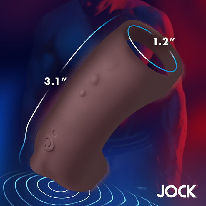 The Jock Vibrating Penis Sleeve and Support with Remote - Chocolate, made of body-safe silicone in brown, features a curved shape, 3.1-inch length, 1.2-inch opening, and appears with a muscular figure and the JOCK logo at the bottom right.