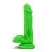 The Neo Elite Beginner 6 Inch Silicone Dual Density Dildo with Balls, in bright green, features a realistic shape—defined head, shaft, and testicles—and a sturdy suction cup base, standing upright on a white background.
