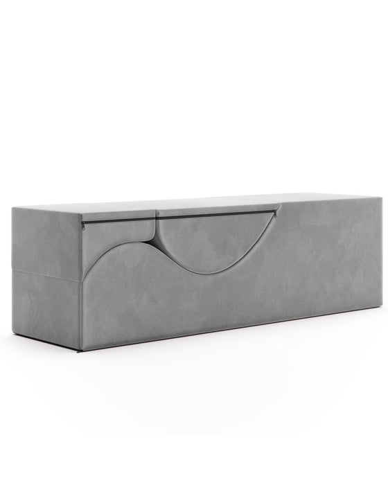 The Liberator Aria Flip Chaise Sex Lounger is a modern, rectangular gray bench with a smooth, curved front panel that discreetly adds style and hidden functionality to your bedroom as a convertible storage bench.
