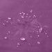 Sentence with the replaced product name and brand name: A purple-tinted image showing a Liberator Fascinator Throw Mini Sized Velvety Sex Blanket spill surrounded by smaller droplets on a moisture barrier surface, creating an abstract pattern.