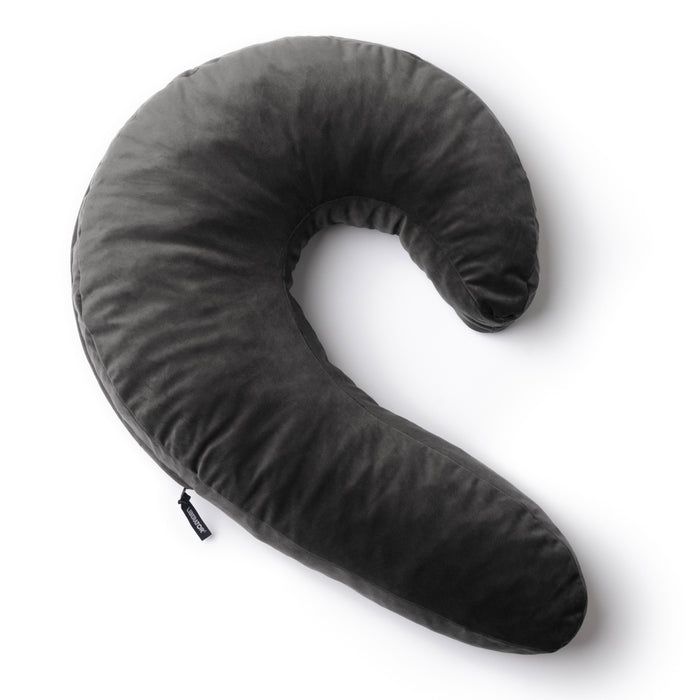 The Liberator Lune Snuggle Pillow with Vibrator Pocket is a large, dark grey C-shaped pillow with a soft cover, designed for ergonomic side-sleeping support. It is shown on a white background.