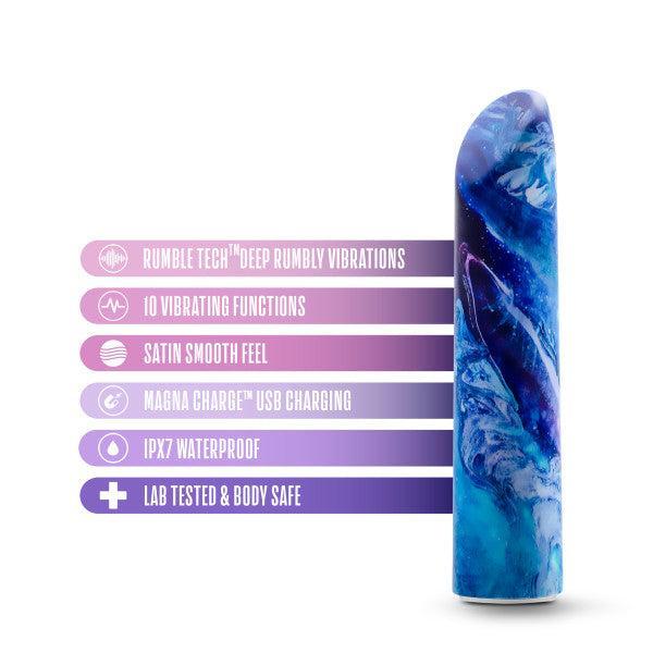 The Blush Limited Addiction Power Bullet Vibe in the Mesmerize pattern, featuring a stunning blue and purple marble-like design, is showcased against a white background. To its left, text highlights its impressive features: "Rumble Tech Deep Rumbly Vibrations, 10 Vibrating Functions, Satin Smooth Feel, USB Rechargeable with Magna Charge technology, IPX7 Waterproof rating, and Lab Tested & Body Safe.