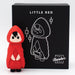 A cute toy figure in a red hooded cloak stands before a black box labeled "Little Red Discreet Powerful Bullet Vibrator," featuring a white outline of the character and promising discreet yet powerful vibrations inside.