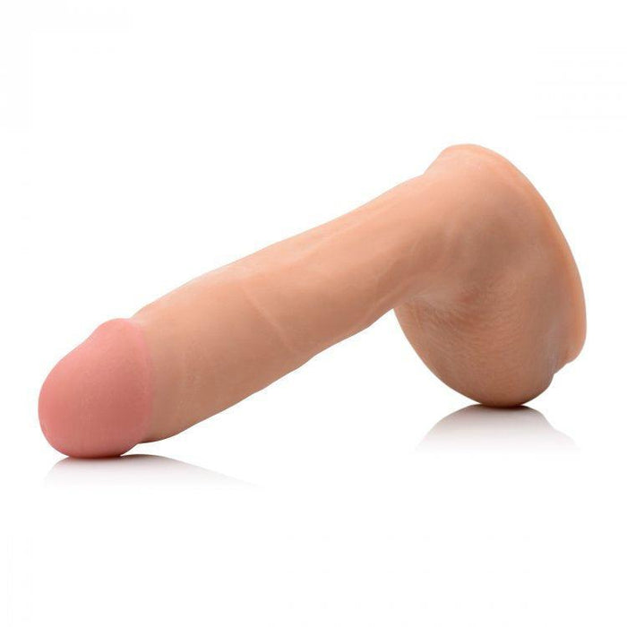 The Loadz Squirting 8 Inch Vanilla Tone Dildo - Squeeze and Squirt from XR Brands is a dual density silicone dildo with a smooth surface, flesh color, and a prominent head. Designed to mimic the shape and appearance of an erect penis, it also features a suction base for upright use on any flat surface.