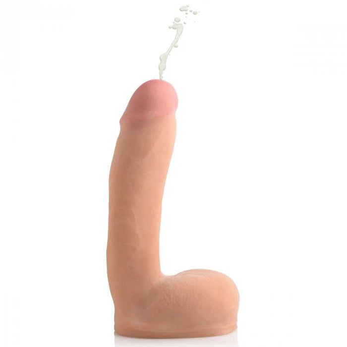 The Loadz Squirting 8 Inch Vanilla Tone Dildo is a realistic silicone toy with a dual density and rounded tip, standing upright on a white background. Designed to resemble a human penis, it includes a small amount of liquid at the top for an authentic experience.
