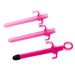 The XR Brands Lubricant Launcher 3-Pack Pink includes three pink plastic syringes with finger grips and a loop at the plunger end; the top two syringes feature smooth tips, while the bottom syringe comes with a black soft rubber tip for feeding or use as a lubricant launcher.