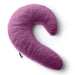 The Liberator Lune Snuggle Pillow with Vibrator Pocket, featuring a pink crescent shape and soft velvety texture, is displayed on a white background.