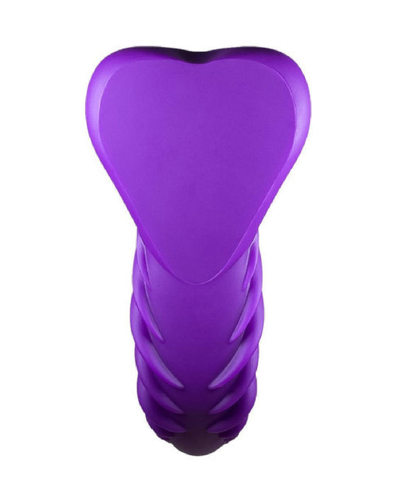 A purple, heart-shaped object with a textured lower section, set against a white background, functioning as a Luvgrind Soft Silicone Stroker, Grinder and Dildo Base - Purple cushion.