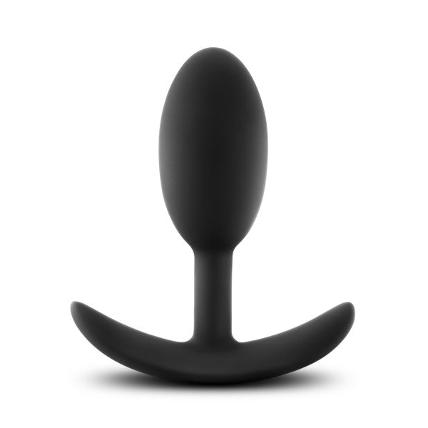 A black silicone anal plug with a bulbous head, tapered neck, and flat base designed for safe and comfortable use. The smooth texture and ergonomic design make it suitable for users seeking anal stimulation. Photographed against a white background, this Luxe Medium Wearable Silicone Vibra Slim Plug from Blush is an excellent choice.
