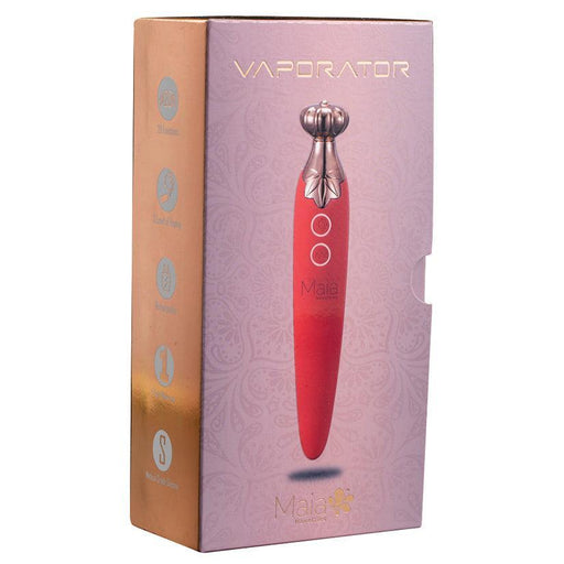 The image shows a product box for the Maia Vaporator Vape and Vibrator Combo - Pink from Maia Toys. The packaging is purple with gold accents and features an image of the pink vibrator. Text highlights features including 10 vibrating functions, waterproof, USB rechargeable, and a soft touch.