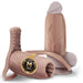 Two beige Girthy Pleasure Sleeves (Size M) made of platinum silicone are shown—one upright, one lying down. Both have realistic detailing and textured grind pads, with a gold "CORE M +50% girth enhancer" badge on one sleeve.
