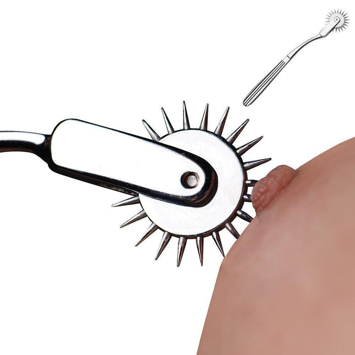 Close-up of a spiked metal wheel, known as the Master Series Silver Sensation Wartenberg Wheel by XR Brands, lightly pressing against a person's skin. The device is crafted from nickel-free metal with a handle, designed for sensual stimulation. A smaller inset image shows the entire tool.