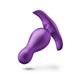The Matrix First Time Flexible Silicone Butt Plug by Blush features a sleek, galactic purple body made from body-safe silicone. Its curved T-shaped base ensures comfort and easy handling. The plug boasts a smooth finish that is ideal for P-spot stimulation and is displayed against a white background, creating the illusion that it is floating due to the slight shadow.