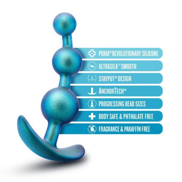 The Blush Matrix First Time Soft Silicone Anal Beads in Shimmery Blue is displayed alongside its features, which include "Puria™ Revolutionary Silicone," "Ultrasilk® Smooth," "Stayput™ Design with AnchorTech™," "Progressing Bead Sizes," "Body Safe & Phthalate Free," and "Fragrance & Paraffin Free.