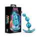 A product image showing a shimmery blue, silicone-beaded anal plug with a curved base. The packaging displays the brand "Blush" and the model name "Matrix First Time Soft Silicone Anal Beads." The box features a holographic design and several icons indicating StayPut technology for enhanced comfort and stability.