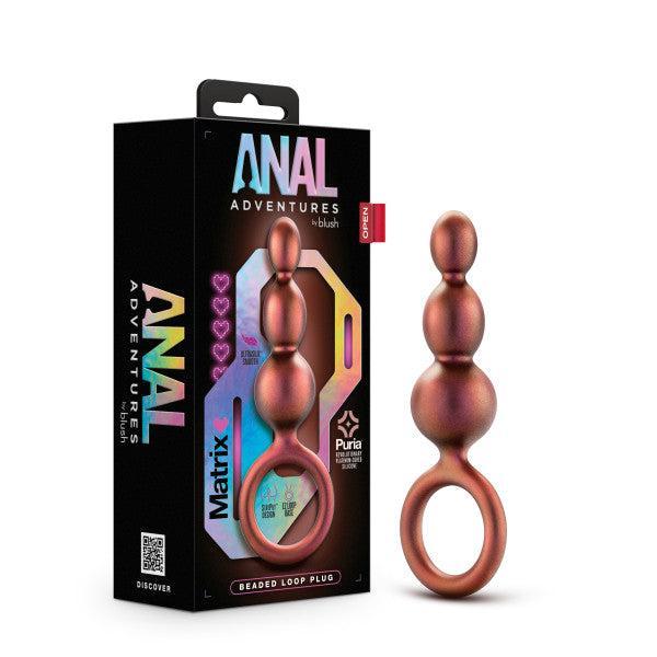 A product image featuring the Blush Matrix First Time Soft Silicone Beaded Anal Beads with Finger Loop. The toy has a smooth, graduated beads design in a bronze color and is displayed in and alongside its packaging, which has vibrant text and graphics that promise orgasm amplification.