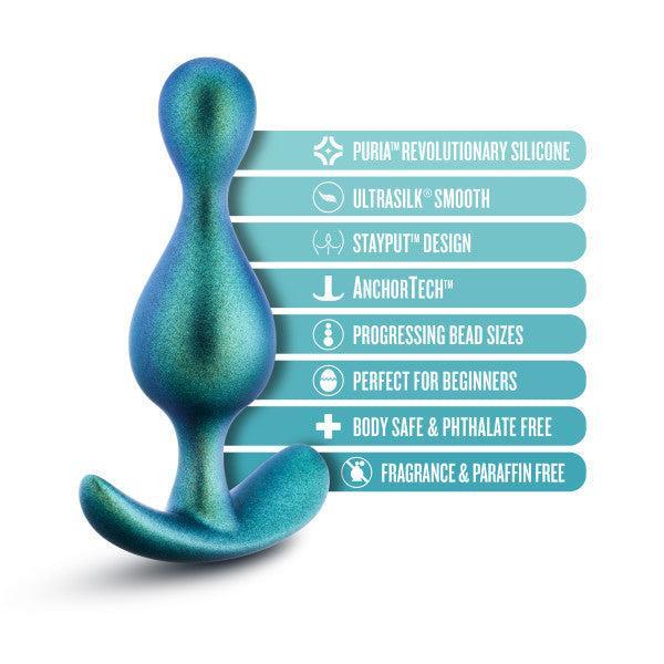 Image of a shimmery green anal plug next to a list of features: "Puria™ revolutionary platinum-cured silicone, Ultrasilk™ smooth, Stayput™ design, AnchorTech™, Progressing bead sizes perfect for beginners, Body safe & phthalate free, Fragrance & paraffin free.