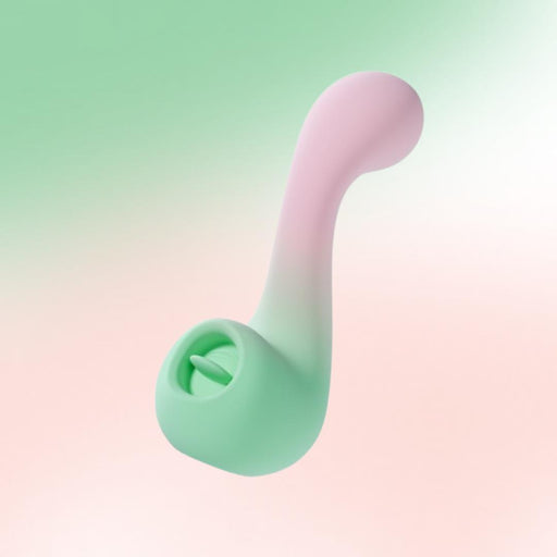 The Melody Double Ended Licking Tongue & G-Spot Vibrator, in pastel pink and green body-safe silicone with a curved design and circular opening, floats against a soft gradient of green and pink hues.