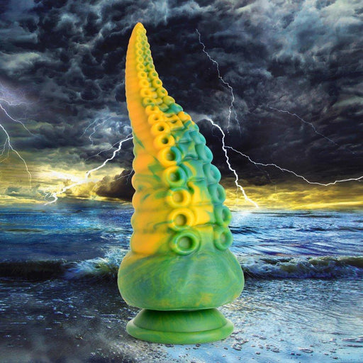 Displayed prominently against the backdrop of a stormy ocean, an 8.5-inch Monstropus Tentacled Monster Silicone Dildo from XR Brands showcases its green and yellow hues. Dark, ominous clouds and lightning bolts fill the sky, creating a dramatic and intense scene. The silicone sex toy features lifelike suction cups and detailed texture, enhancing its realistic appearance.
