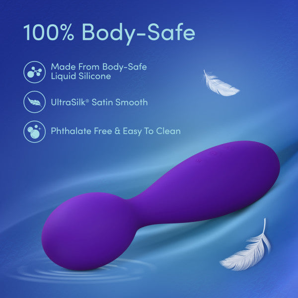 The Velvet High Versatile Internal or External Vibrator with Flexible Neck in purple silicone is showcased on a blue background with floating white feathers. It’s 100% body-safe, phthalate-free, easy to clean, and delivers powerful clitoral stimulation.