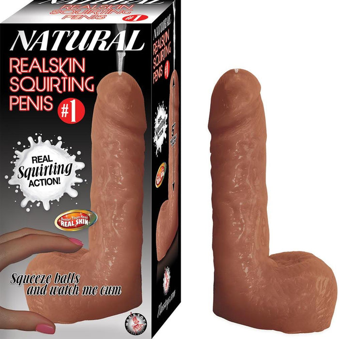 An image showcases the Natural Realskin Squirting Dildo 6 Inch - Chocolate by Nasstoys alongside its packaging. The dildo features a detailed, lifelike design made of flexible TPR material. The packaging highlights the name "Natural Realskin Squirting Dildo 6 Inch - Chocolate" and promotes its "Real Squirting Action" with an illustration of cum play as a hand squeezes the toy.
