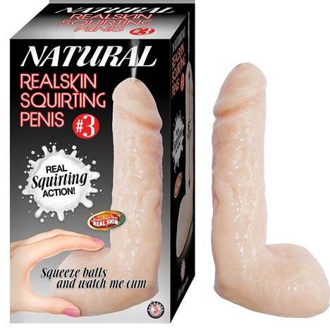 A boxed product titled “Natural Realskin Squirting Dildo 7.5 Inch - Vanilla” by Nasstoys is displayed. The box image features a realistic squirting dildo made of flexible TPR material and text highlighting its insertable length and lifelike skin texture. The product is positioned outside the box, adjacent to the packaging.