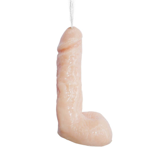 Introducing the Natural Realskin Squirting Dildo 7.5 Inch - Vanilla by Nasstoys, a detailed and textured candle shaped like an erect penis, crafted from flexible TPR material in a pale fleshtone color. This unique product features an extendable wick emerging from the top for a truly eye-catching display.