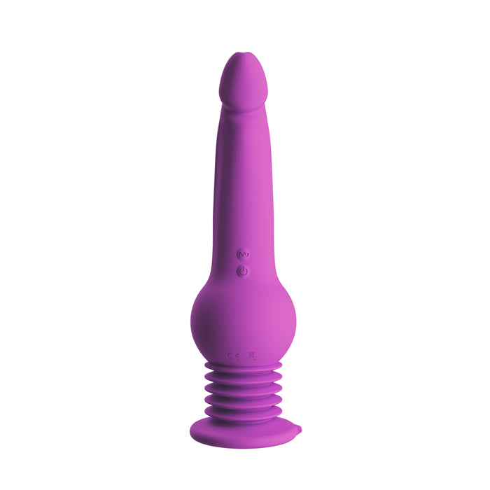 The New York Gyro Quake Thrusting 9.75 Inch Silicone Dildo from Blush is a purple, phallic-shaped silicone dildo with a ribbed base and control buttons on the shaft. The waterproof bottom section features a suction cup for hands-free use and offers various vibrating modes for enhanced pleasure.