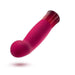 The Oh My Gem Classy Garnet Warming Internal & External Vibrator by Blush, with its smooth, curved body and bulbous tip in striking pink and red hues, floats against a plain white background. Designed for ultimate pleasure, the device boasts multiple vibrating functions and features a glossy, garnet gemstone-like finish at the tapered base.