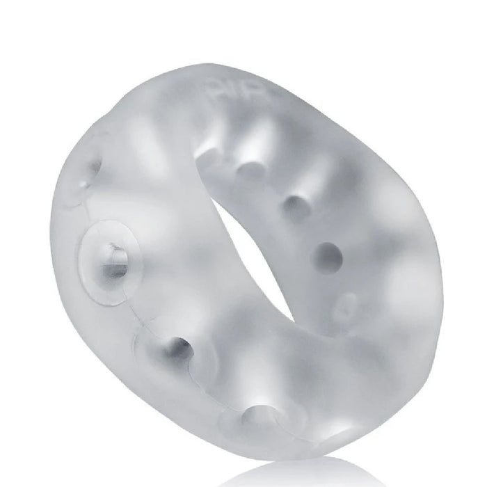 A transparent, flexible, rubber ring crafted from a super-soft silicone blend with a wavy texture and small openings around its circumference. The **Oxballs Air Flow Light Stretchy Cock Ring - Clear** by **Oxballs** has a smooth finish and is three-dimensional, appearing slightly frosted for long-wear comfort.