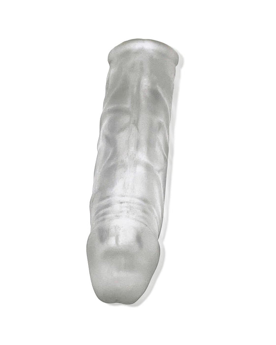 A transparent, cylindrical silicone sleeve with a slightly tapered end resembling the shape of a finger. The Oxballs Dicker 7.5 Inch Cock Sheath - Clear Ice sheath boasts a textured surface with subtle ridges along its length for added sensation. The background is plain white.