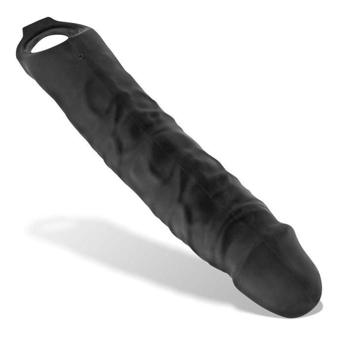 The Oxballs Snake Extra Long 11 Inch Cock Sheath with Ball Strap in black by Oxballs is displayed with a veiny texture and a hollow interior. It features an open ring handle at one end and a smooth, tapered tip at the other.