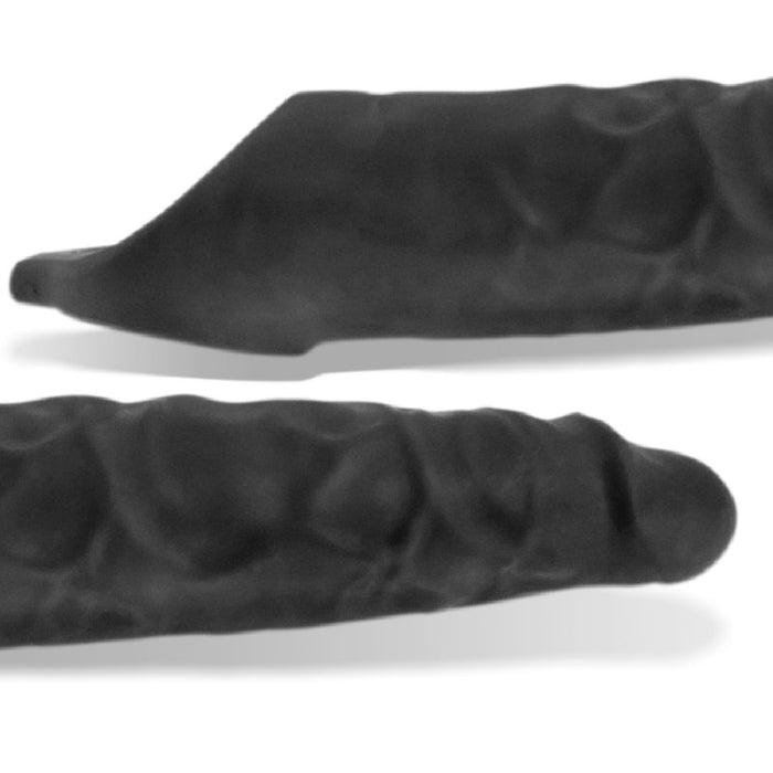 Close-up view of two Oxballs Snake Extra Long 11 Inch Cock Sheaths with Ball Straps in black, featuring a veiny texture. Positioned parallel to each other against a white background, these objects have an irregular shape with one end more pointed and the other rounded.