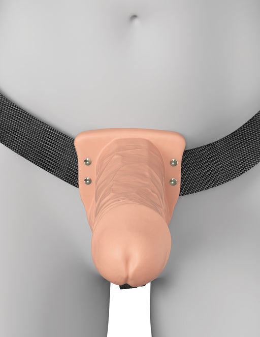 The Fantasy X-Tensions Elite Vibrating Hollow 7 Inch Silicone Dildo & Strap-On Harness - Vanilla is worn around the waist, featuring a realistic vanilla-tone dildo attached to a harness, displayed from lower torso to upper thighs.