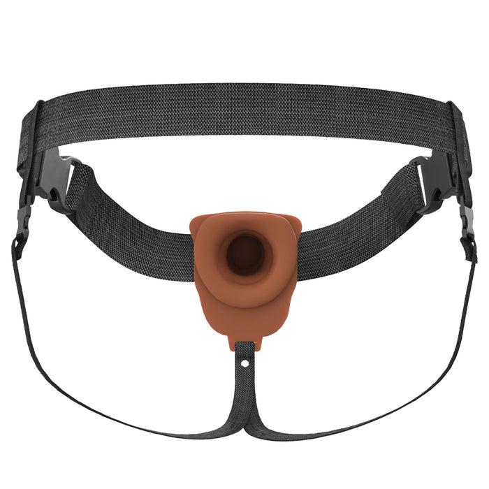 The Fantasy X-Tensions Elite Vibrating Hollow 7 Inch Silicone Dildo & Strap-On Harness in Chocolate features a black adjustable harness with a brown, cup-shaped silicone attachment, ideal for medical or assistive purposes.