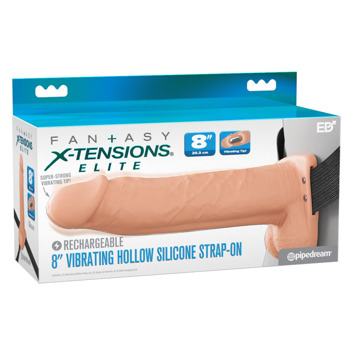 A retail box displays the Fantasy X-Tensions Elite Vibrating Hollow 8 Inch Silicone Dildo & Strap-On Harness - Vanilla, highlighting features like a realistic sleeve, rechargeable design, and vibrating tip.
