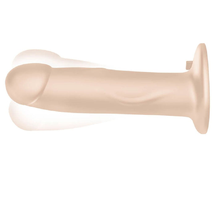 Pegasus 8" Realistic Vibrating Strap-on Dildo and Harness Set - Vanilla Tone suction cupped to a wall
